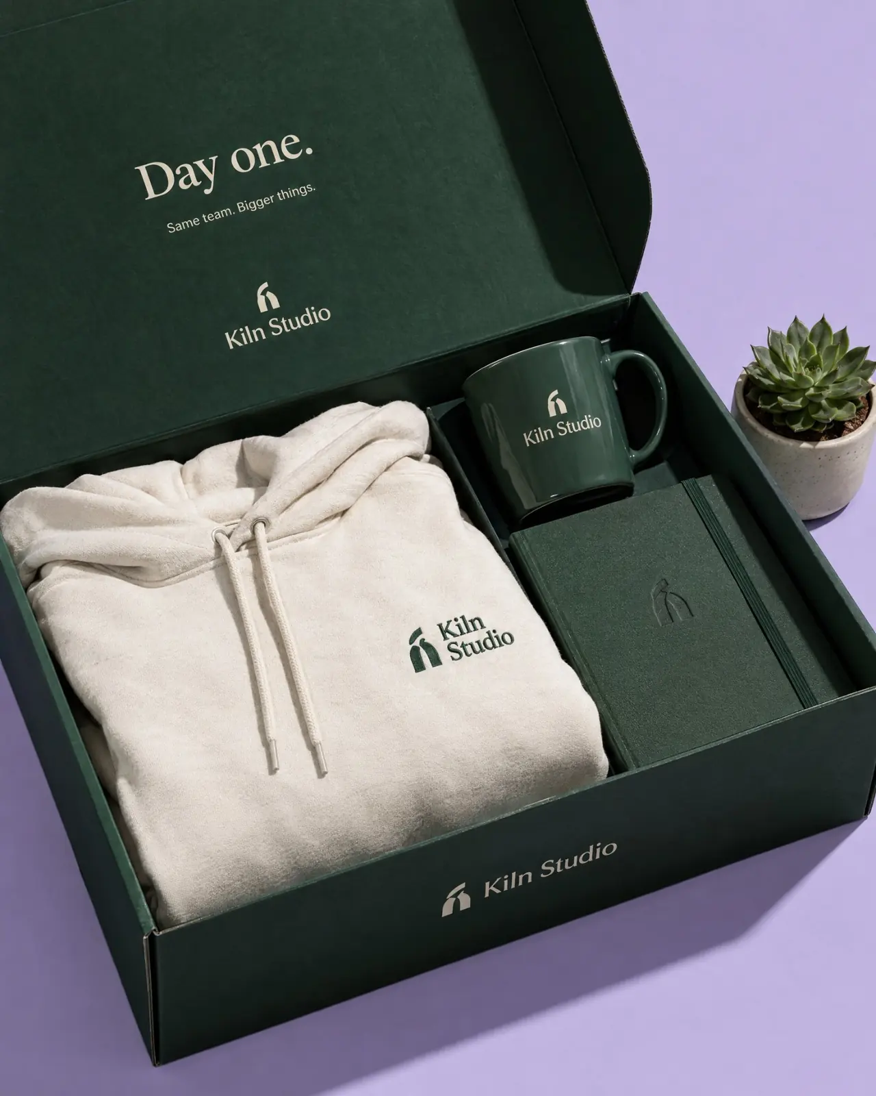 Kiln Studio day one welcome box with branded merchandise