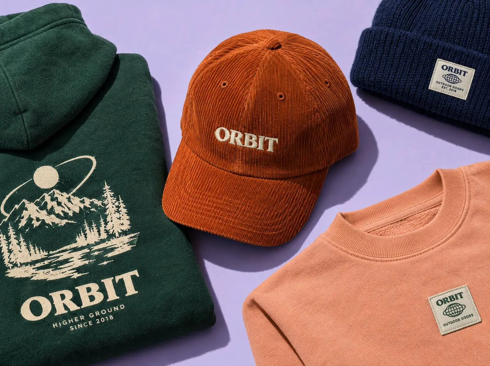 Orbit embroidered apparel laid out flat